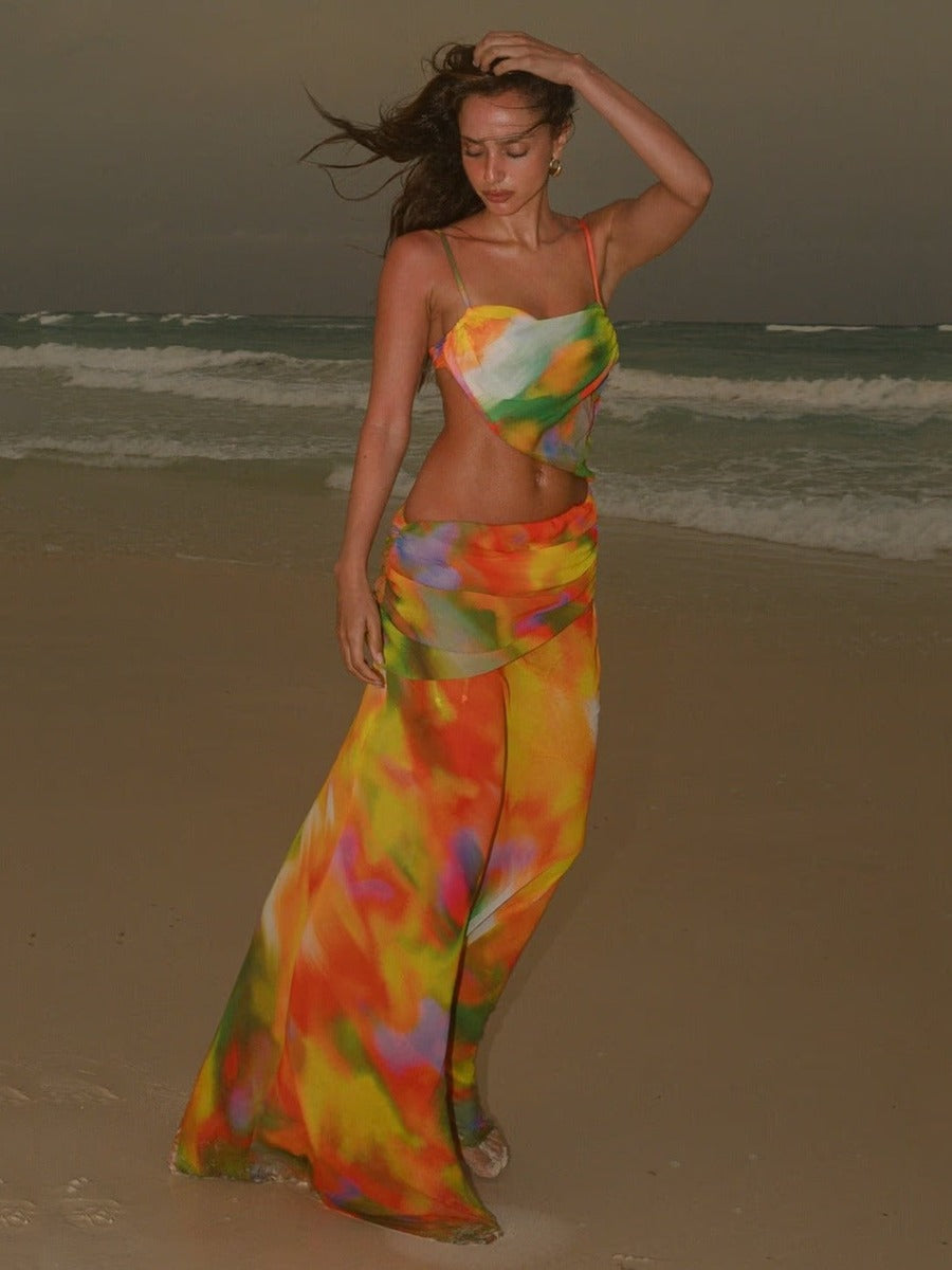 Two piece bikini beach,wearing a colorful,patterned sarong or beach cover-up.