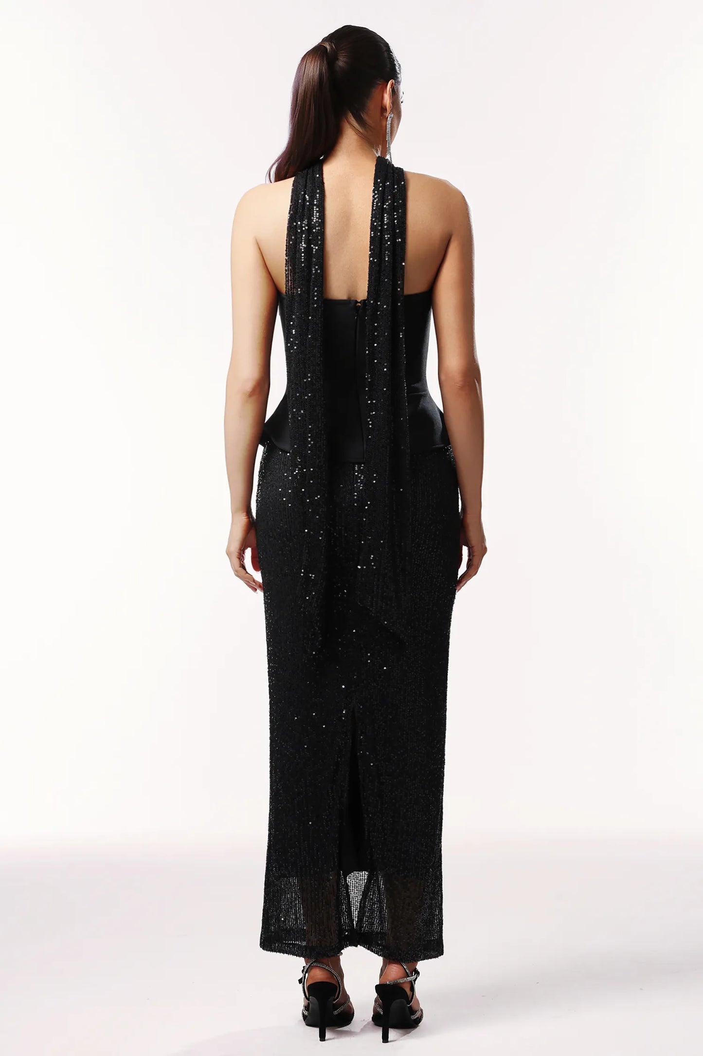 Midnight Eclipse: The Sculpted Peplum Gown