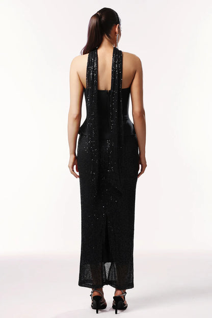 Midnight Eclipse: The Sculpted Peplum Gown