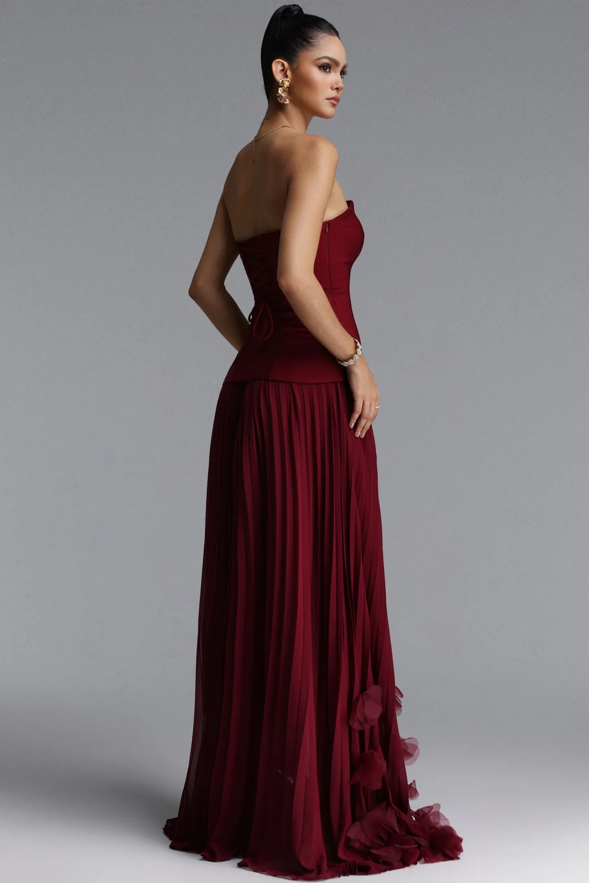 Structured Longline Pleated Gown with 3D Rosettes - Deep Burgundy