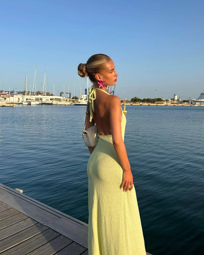 Light green halter maxi dress with a thigh-high slit