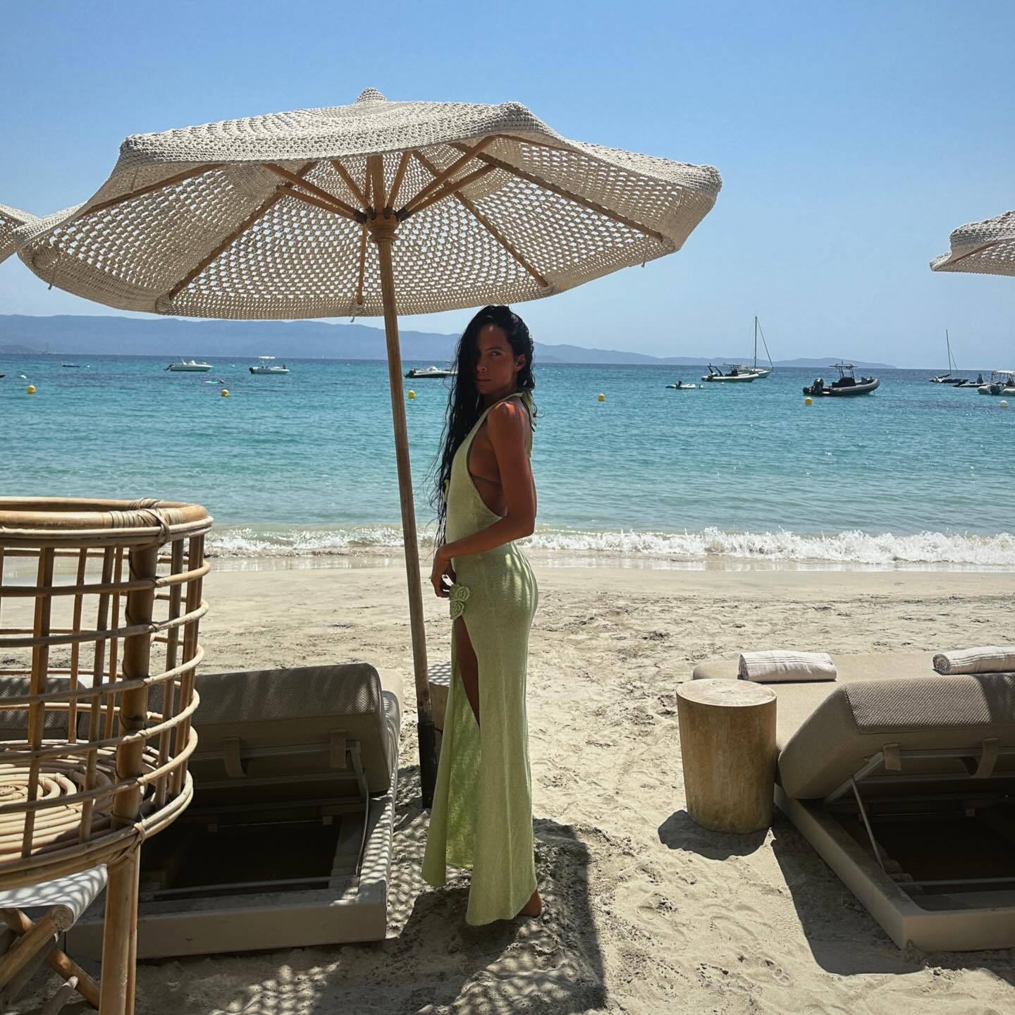 Light green halter maxi dress with a thigh-high slit