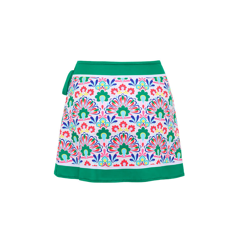 Boden porto v-neck tile print swimsuit with a matching wrap style skirt.