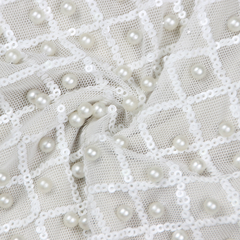 The Pearl-Encrusted Luminary Gown