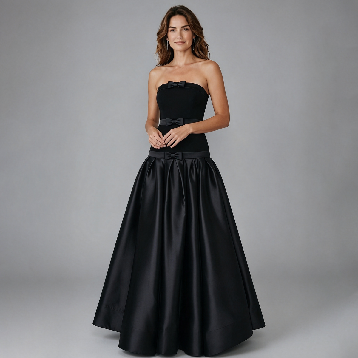 Elegant Black Strapless Gown with Voluminous Satin Skirt