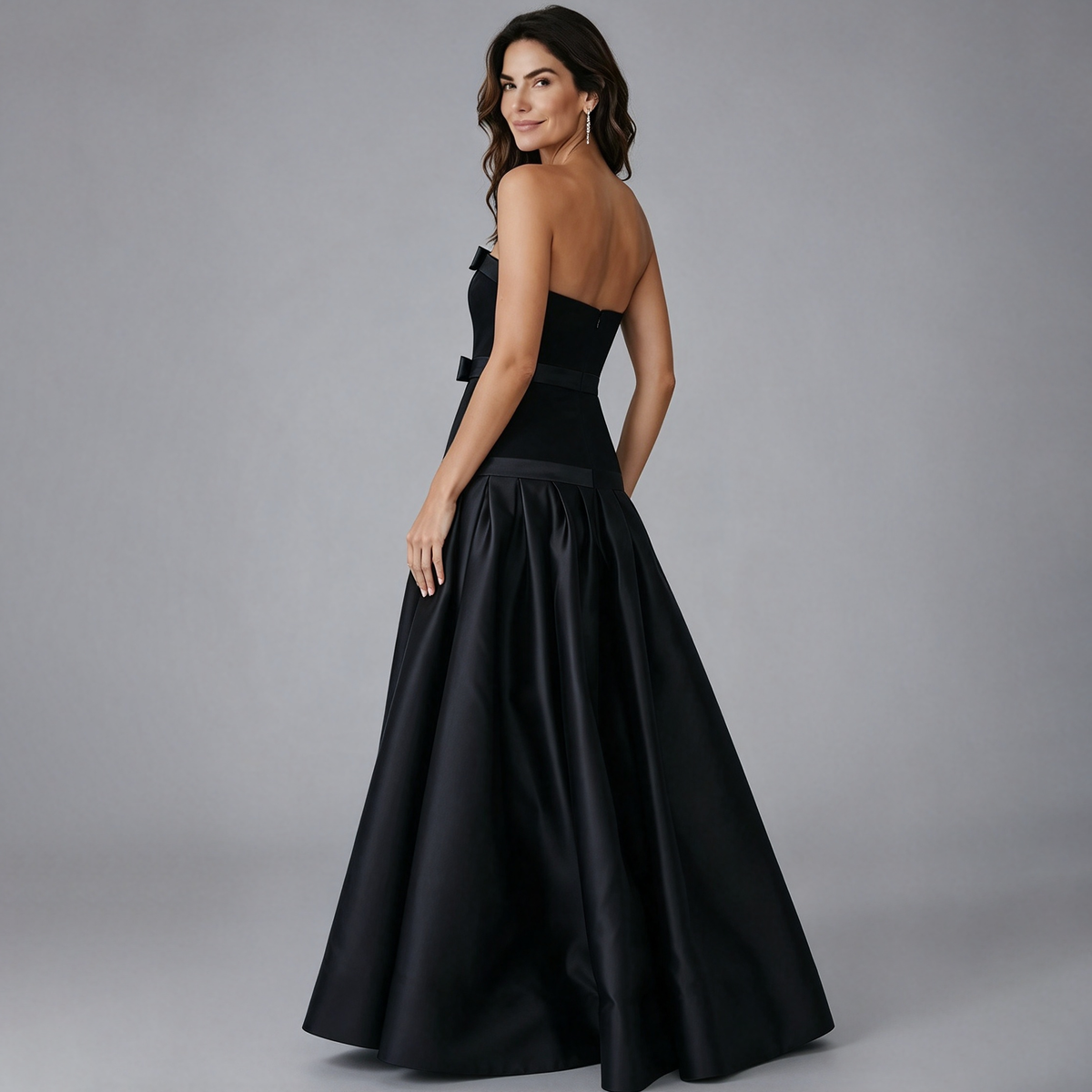 Elegant Black Strapless Gown with Voluminous Satin Skirt