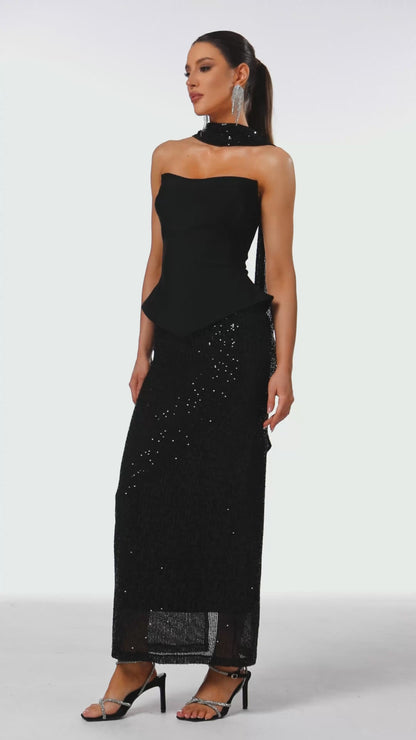 Midnight Eclipse: The Sculpted Peplum Gown